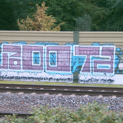 Graffiti and street art from a photo tour in Bremen including colourful sprayed tags and top-to-bottoms.