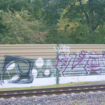 Graffiti and street art from a photo tour in Bremen including colourful sprayed tags and top-to-bottoms.