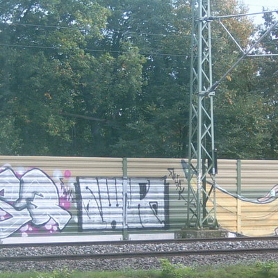 Graffiti and street art from a photo tour in Bremen including colourful sprayed tags and top-to-bottoms.