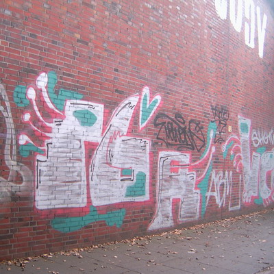 Graffiti and street art from a photo tour in Bremen including colourful sprayed tags and top-to-bottoms.