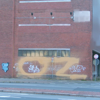 Graffiti and street art from a photo tour in Bremen including colourful sprayed tags and top-to-bottoms.