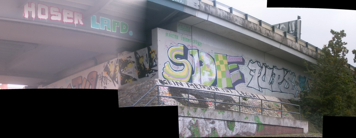 Graffiti and street art from a photo tour in Bremen including colourful sprayed tags and top-to-bottoms.