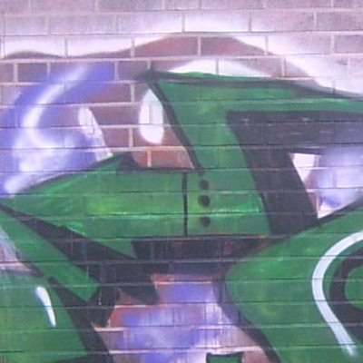 Graffiti and street art from a photo tour in Bremen including colourful sprayed tags and top-to-bottoms.