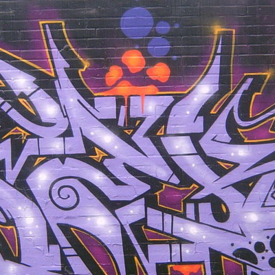 Graffiti and street art from a photo tour in Bremen including colourful sprayed tags and top-to-bottoms.