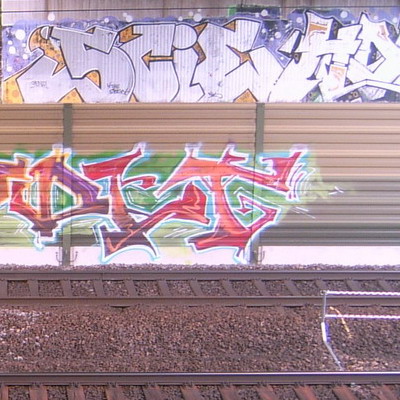 Graffiti and street art from a photo tour in Bremen including colourful sprayed tags and top-to-bottoms.
