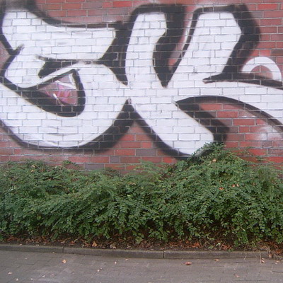 Graffiti and street art from a photo tour in Bremen including colourful sprayed tags and top-to-bottoms.