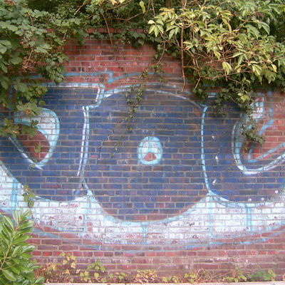 Graffiti and street art from a photo tour in Bremen including colourful sprayed tags and top-to-bottoms.