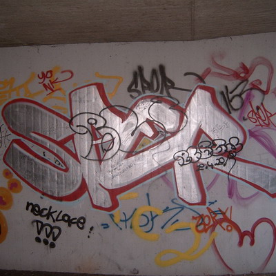 Graffiti and street art from a photo tour in Bremen including colourful sprayed tags and top-to-bottoms.