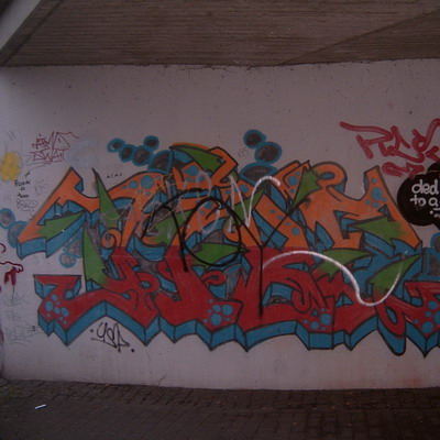 Graffiti and street art from a photo tour in Bremen including colourful sprayed tags and top-to-bottoms.