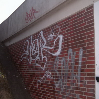 Graffiti and street art from a photo tour in Bremen including colourful sprayed tags and top-to-bottoms.