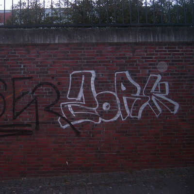 Graffiti and street art from a photo tour in Bremen including colourful sprayed tags and top-to-bottoms.
