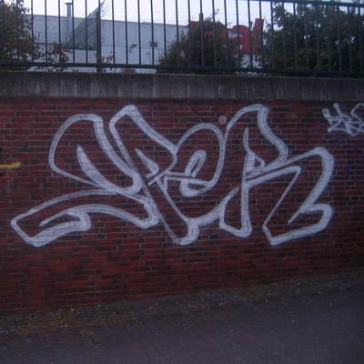 Graffiti and street art from a photo tour in Bremen including colourful sprayed tags and top-to-bottoms.