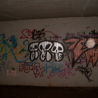 Graffiti and street art from a photo tour in Bremen including colourful sprayed tags and top-to-bottoms.