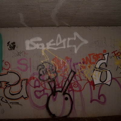 Graffiti and street art from a photo tour in Bremen including colourful sprayed tags and top-to-bottoms.