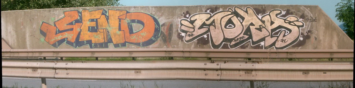 Graffiti and street art from a photo tour in Bremen including colourful sprayed tags and top-to-bottoms.