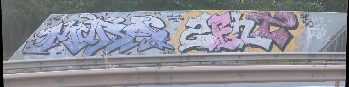 Graffiti and street art from a photo tour in Bremen including colourful sprayed tags and top-to-bottoms.