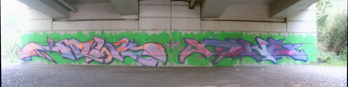Graffiti and street art from a photo tour in Bremen including colourful sprayed tags and top-to-bottoms.