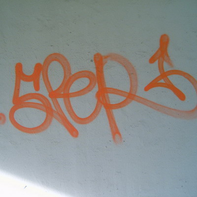Graffiti and street art from a photo tour in Bremen including colourful sprayed tags and top-to-bottoms.