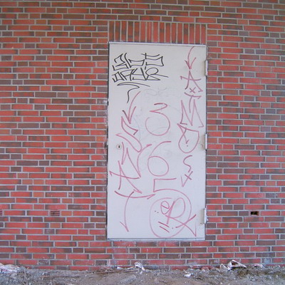 Graffiti and street art from a photo tour in Bremen including colourful sprayed tags and top-to-bottoms.