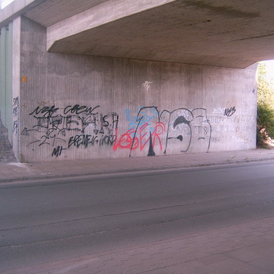 Graffiti and street art from a photo tour in Bremen including colourful sprayed tags and top-to-bottoms.