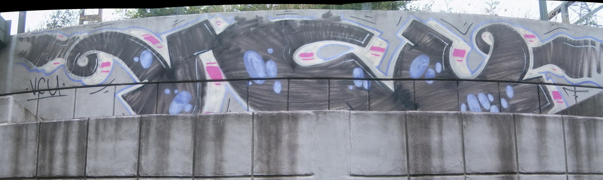 Graffiti and street art from a photo tour in Bremen including colourful sprayed tags and top-to-bottoms.