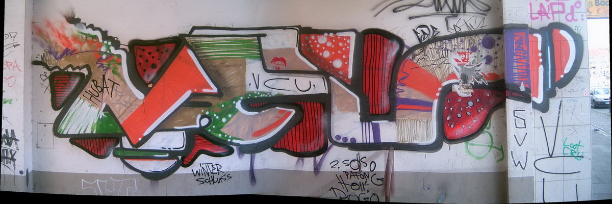 Graffiti and street art from a photo tour in Bremen including colourful sprayed tags and top-to-bottoms.
