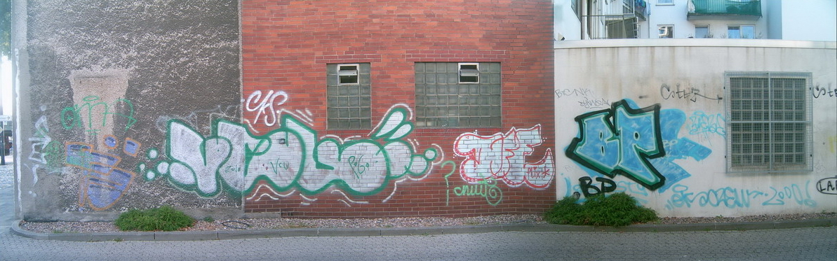 Graffiti and street art from a photo tour in Bremen including colourful sprayed tags and top-to-bottoms.