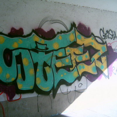 Graffiti and street art from a photo tour in Bremen including colourful sprayed tags and top-to-bottoms.