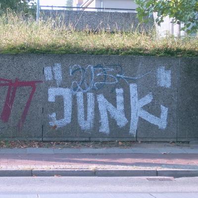 Graffiti and street art from a photo tour in Bremen including colourful sprayed tags and top-to-bottoms.