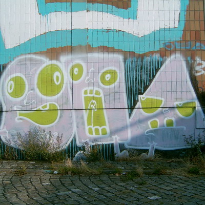 Graffiti and street art from a photo tour in Bremen including colourful sprayed tags and top-to-bottoms.