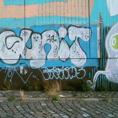 Graffiti and street art from a photo tour in Bremen including colourful sprayed tags and top-to-bottoms.