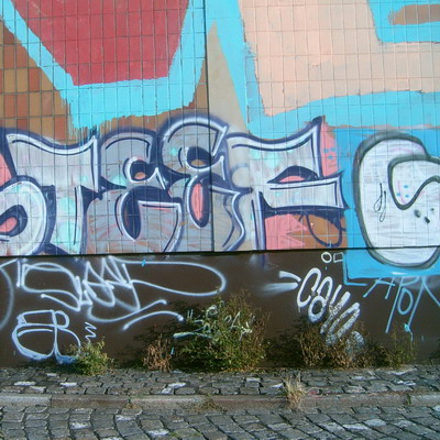 Graffiti and street art from a photo tour in Bremen including colourful sprayed tags and top-to-bottoms.
