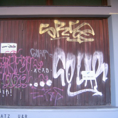 Graffiti and street art from a photo tour in Bremen including colourful sprayed tags and top-to-bottoms.