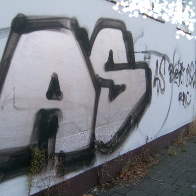 Graffiti and street art from a photo tour in Bremen including colourful sprayed tags and top-to-bottoms.