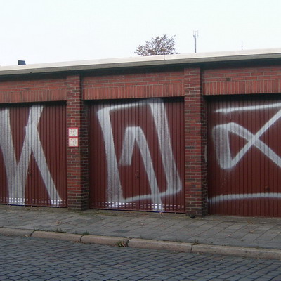 Graffiti and street art from a photo tour in Bremen including colourful sprayed tags and top-to-bottoms.