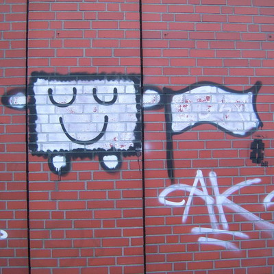 Graffiti and street art from a photo tour in Bremen including colourful sprayed tags and top-to-bottoms.