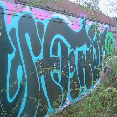 Graffiti and street art from a photo tour in Bremen including colourful sprayed tags and top-to-bottoms.