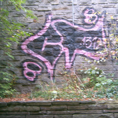Graffiti and street art from a photo tour in Bremen including colourful sprayed tags and top-to-bottoms.