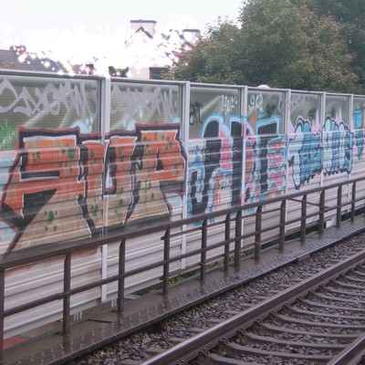 Graffiti and street art from a photo tour in Bremen including colourful sprayed tags and top-to-bottoms.