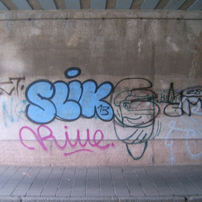 Graffiti and street art from a photo tour in Bremen including colourful sprayed tags and top-to-bottoms.