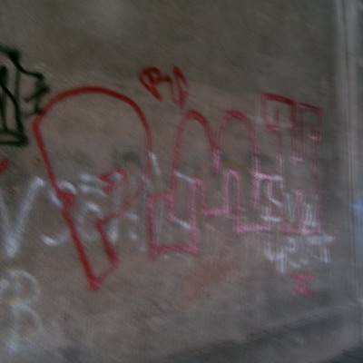 Graffiti and street art from a photo tour in Bremen including colourful sprayed tags and top-to-bottoms.