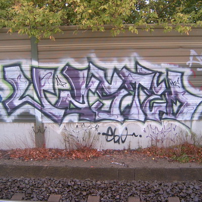 Graffiti and street art from a photo tour in Bremen including colourful sprayed tags and top-to-bottoms.