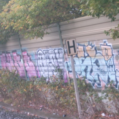 Graffiti and street art from a photo tour in Bremen including colourful sprayed tags and top-to-bottoms.