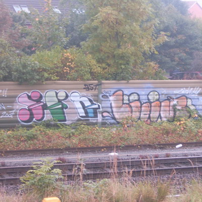 Graffiti and street art from a photo tour in Bremen including colourful sprayed tags and top-to-bottoms.