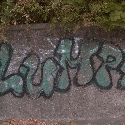 Graffiti and street art from a photo tour in Bremen including colourful sprayed tags and top-to-bottoms.