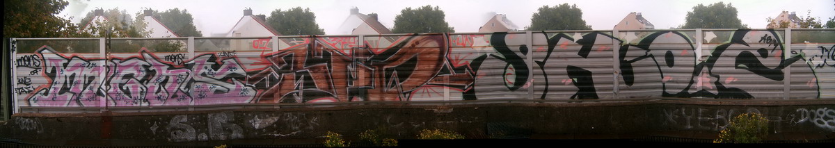 Graffiti and street art from a photo tour in Bremen including colourful sprayed tags and top-to-bottoms.