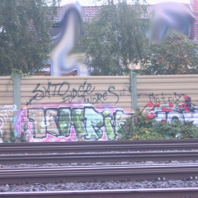 Graffiti and street art from a photo tour in Bremen including colourful sprayed tags and top-to-bottoms.