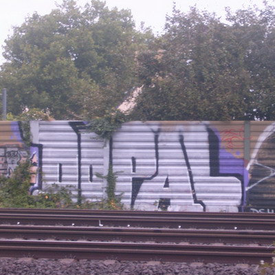 Graffiti and street art from a photo tour in Bremen including colourful sprayed tags and top-to-bottoms.