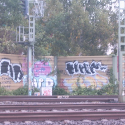 Graffiti and street art from a photo tour in Bremen including colourful sprayed tags and top-to-bottoms.