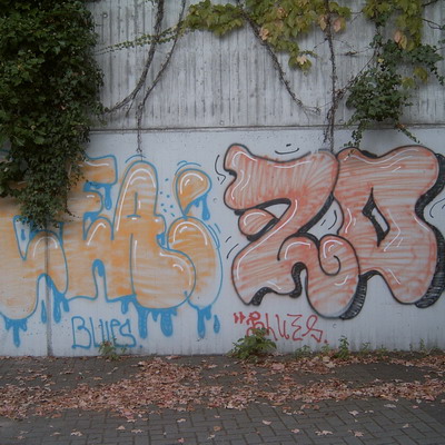 Graffiti and street art from a photo tour in Bremen including colourful sprayed tags and top-to-bottoms.